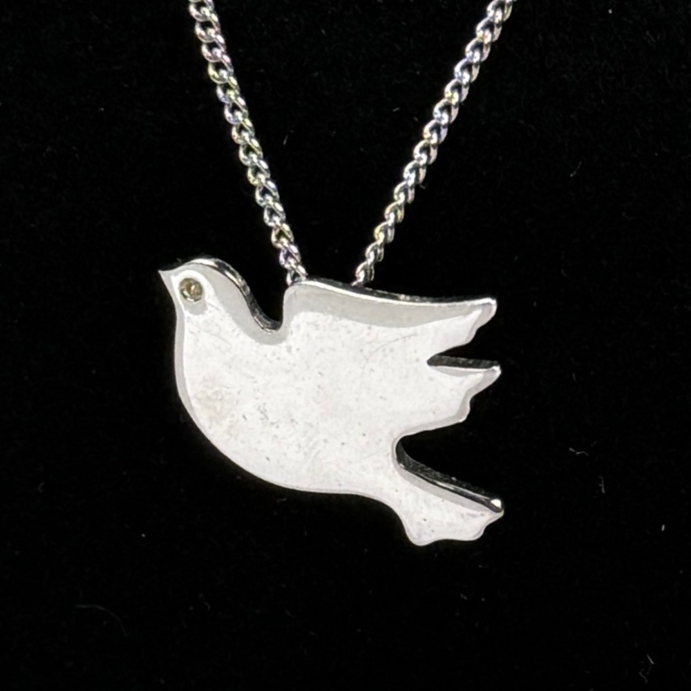 Vintage Avon Silvertone weighted dove pendant, long chain necklace